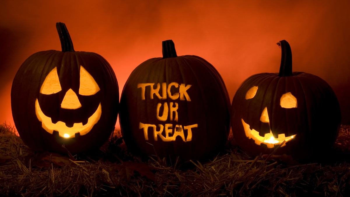 Jack-o-lanterns lit up at night