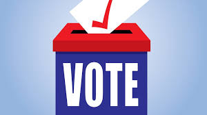 A cartoon ballot box with someone casting their vote