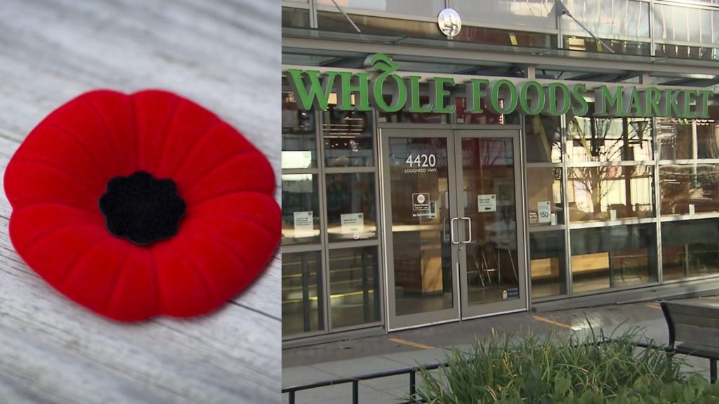 A photo of a poppy beside an outsite storefront of Whole Foods.