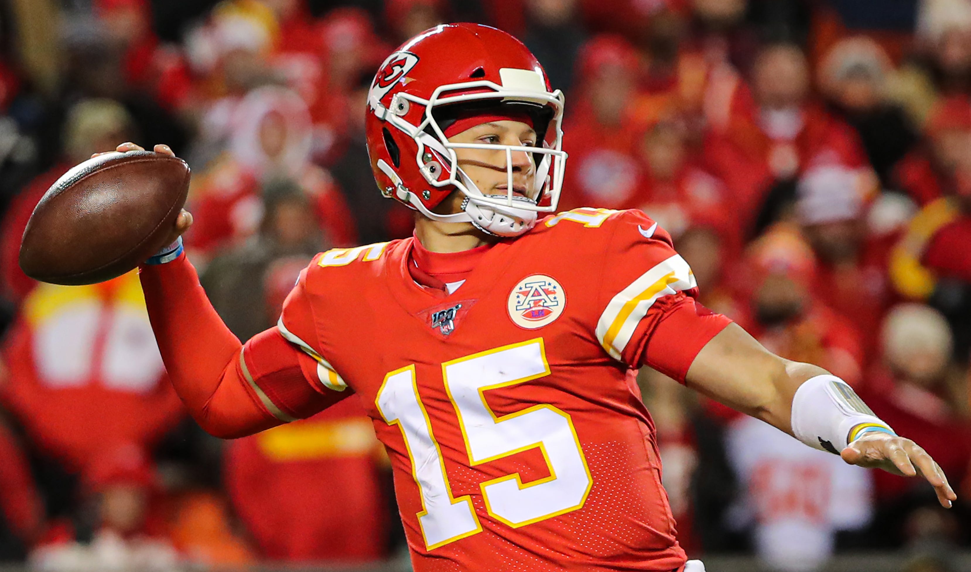 Patrick Mahomes throwing a football