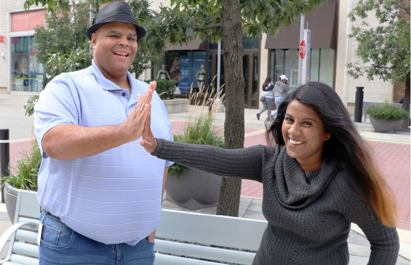 Kelly and Ramya high fiving