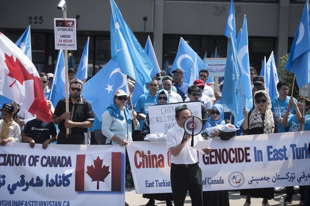 Members of the Uyghur diaspora and their allies protest outside the Chinese embassy in Toronto back in 2019.