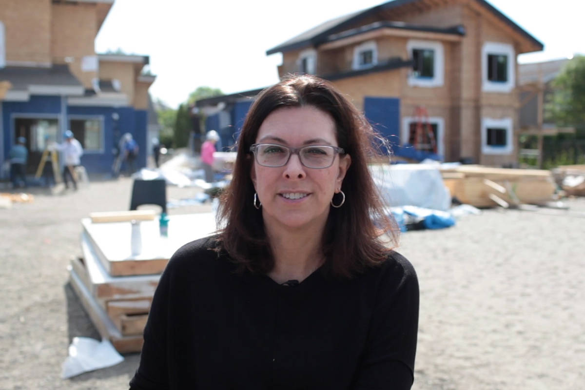 A photo of MLA Stephanie Cadieux outside in a contruction site for new homes. 