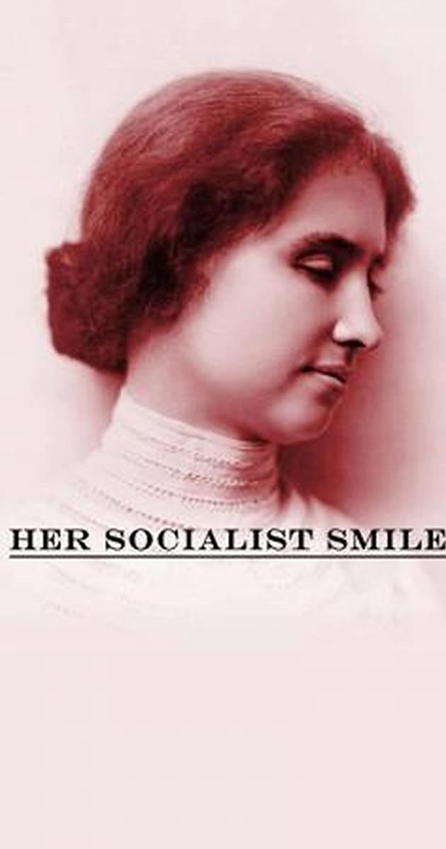 A red scale movie poster with a Helen Keller looking downward and off to the side. Below reads "Her Socialist Smile."
