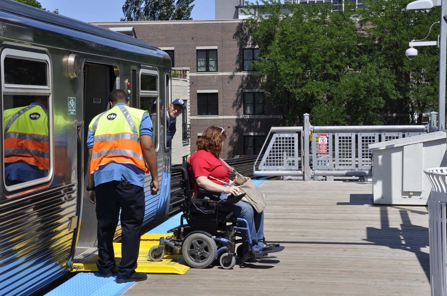 A person using a ramp on a public transit bus.