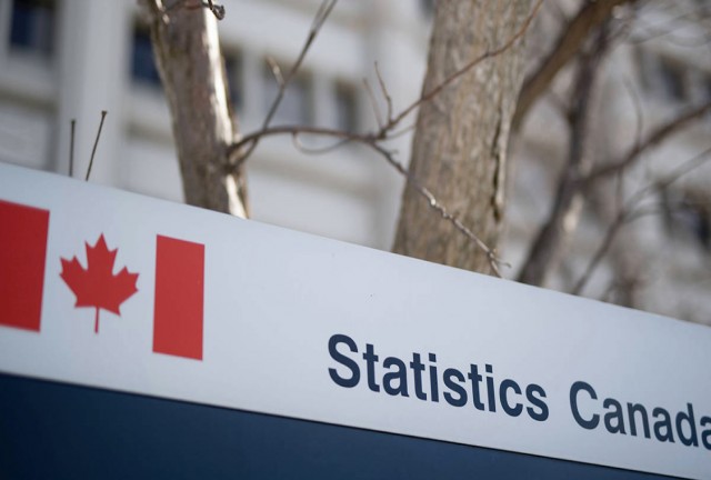 A close up of an outdoor Statistics Canada sign. 