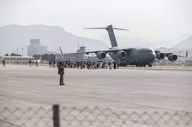 A military plane sits on an Afghanistan tarmac 
