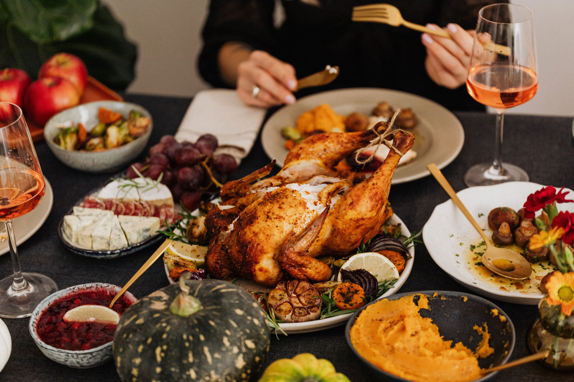 A family sitting together enjoying a Thanksgiving meal